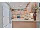 Well-equipped kitchen featuring granite countertops, stainless steel appliances, and abundant storage at 21968 W Hadley St, Buckeye, AZ 85326