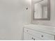 Powder room featuring a modern vanity with a framed mirror at 2438 W Via Dona Rd, Phoenix, AZ 85085