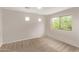 Comfortable bedroom with natural light and neutral colors at 2438 W Via Dona Rd, Phoenix, AZ 85085
