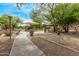 Community park featuring walking path, playground, and picnic area at 2438 W Via Dona Rd, Phoenix, AZ 85085