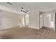 Main bedroom offering space, natural light, ceiling fan, and en-suite bathroom at 2438 W Via Dona Rd, Phoenix, AZ 85085