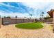Backyard with artificial turf and gravel at 2551 E Harmony Ave, Mesa, AZ 85204