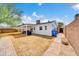 Backyard with a covered patio area and rock landscaping at 2801 N 10Th St, Phoenix, AZ 85006