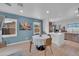 Bright dining area with a round table, natural light, and an open view to the kitchen at 2801 N 10Th St, Phoenix, AZ 85006