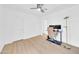 A clean office space features light wood floors, a ceiling fan, and abundant natural light at 2801 N 10Th St, Phoenix, AZ 85006