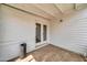 A patio with brick flooring and a set of double doors, offering a cozy outdoor space at 2801 N 10Th St, Phoenix, AZ 85006