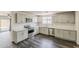 Modern kitchen boasts stainless steel appliances, granite countertops, and a stylish backsplash at 3017 N 46Th Dr, Phoenix, AZ 85031