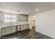 Modern kitchen boasts stainless steel appliances, granite countertops, and a stylish backsplash at 3017 N 46Th Dr, Phoenix, AZ 85031