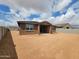 New construction home with a large, blank canvas backyard ready for the landscape of your dreams at 37114 W La Paz St, Maricopa, AZ 85138