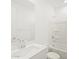 This bathroom features a shower and tub combination, with modern fixtures and bright lighting at 37114 W La Paz St, Maricopa, AZ 85138
