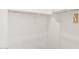 Walk-in closet with white walls, shelving, and hanging rods at 37114 W La Paz St, Maricopa, AZ 85138