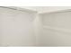 A bright, walk-in closet features shelves and racks for hanging clothing at 37114 W La Paz St, Maricopa, AZ 85138