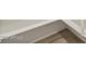 Neutral colored, rectangular tile on the floor and white trim on the wall at 37114 W La Paz St, Maricopa, AZ 85138