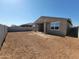 Expansive backyard with potential for landscaping and outdoor living, great for entertaining and relaxation at 37414 W San Sisto Ave, Maricopa, AZ 85138