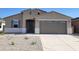 Charming single-story home features a well-kept front yard and a convenient two-car garage, offering comfort and style at 37414 W San Sisto Ave, Maricopa, AZ 85138