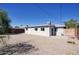 Large backyard with rock ground cover surrounded by red brick walls at 3841 N 21St Ave, Phoenix, AZ 85015