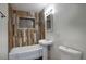 Charming bathroom featuring tiled walls around the shower-tub combination and pedestal sink at 3841 N 21St Ave, Phoenix, AZ 85015