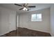 Bedroom with natural light, ceiling fan, closet space, and neutral walls at 3841 N 21St Ave, Phoenix, AZ 85015