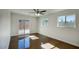 Bright living room with large windows and sliding glass doors to an outdoor space at 3841 N 21St Ave, Phoenix, AZ 85015