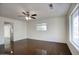 Bright and airy living room with large windows and a modern ceiling fan at 3841 N 21St Ave, Phoenix, AZ 85015
