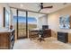 Bright office space with large sliding glass doors and outdoor desert views, conducive for inspiration and productivity at 39602 N Charles Blair Macdonald Rd, Scottsdale, AZ 85262