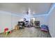 View of basement showcasing an office space, play area, and durable tile flooring at 4162 W Sierra St, Phoenix, AZ 85029