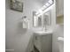 Bright bathroom featuring a stylish vanity, modern lighting, and neutral tones for a clean and inviting space at 4162 W Sierra St, Phoenix, AZ 85029
