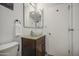 Bathroom featuring a glass bowl sink, granite countertop, and convenient access to the toilet and vanity at 4162 W Sierra St, Phoenix, AZ 85029