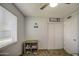 Charming bedroom featuring a shoe rack, plenty of natural light, and easy access to closet space at 4162 W Sierra St, Phoenix, AZ 85029