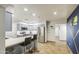 Bright, modern kitchen with stainless appliances, sleek counters and breakfast bar seating at 4162 W Sierra St, Phoenix, AZ 85029