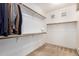 Walk-in closet with plenty of hanging and shelf space at 43228 W Knauss Dr, Maricopa, AZ 85138