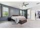 Spacious main bedroom with walk-in closet and stylish barn door to bathroom at 5029 S Carlyle Dr, Gilbert, AZ 85298