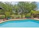 Sparkling pool with pristine landscaping and picturesque views of the nearby greenbelt at 5029 S Carlyle Dr, Gilbert, AZ 85298