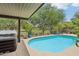 Inviting backyard pool and spa area with manicured landscaping and private fencing at 5029 S Carlyle Dr, Gilbert, AZ 85298