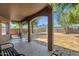 View of a spacious backyard featuring a covered patio and block wall fencing at 508 W San Angelo St, Gilbert, AZ 85233