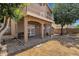 View of the home's backyard featuring a covered patio and second story balcony at 508 W San Angelo St, Gilbert, AZ 85233
