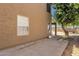 Exterior view of the home's backyard and patio area with desert landscaping at 508 W San Angelo St, Gilbert, AZ 85233