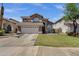 Charming two-story home featuring a lush lawn and an attached two-car garage at 508 W San Angelo St, Gilbert, AZ 85233