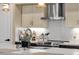 Bright kitchen featuring stainless steel appliances, light countertops, and cream colored cabinets at 508 W San Angelo St, Gilbert, AZ 85233