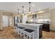Well-equipped kitchen island with seating, stainless steel appliances, and an open layout, ideal for entertaining at 508 W San Angelo St, Gilbert, AZ 85233