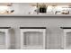 Kitchen island with white wooden stools and white countertop, offering a clean and stylish look at 508 W San Angelo St, Gilbert, AZ 85233