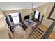 Aerial view of living room featuring tile floors, leather couches, and a ceiling fan at 508 W San Angelo St, Gilbert, AZ 85233