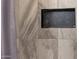 Close-up of tiled shower featuring a convenient built-in niche for storage at 508 W San Angelo St, Gilbert, AZ 85233