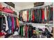 Spacious walk-in closet with built-in shelving and lots of space to organize your clothes at 508 W San Angelo St, Gilbert, AZ 85233