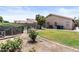 Well-maintained backyard with lush green grass and a sparkling pool at 512 W Encinas St, Gilbert, AZ 85233