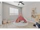Playful bedroom with decorative Teepee with rug at 512 W Encinas St, Gilbert, AZ 85233