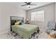 Bright bedroom with modern ceiling fan and stylish decor rug at 512 W Encinas St, Gilbert, AZ 85233