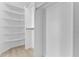 Large walk-in closet with ample shelving and storage space at 512 W Encinas St, Gilbert, AZ 85233