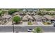 Aerial view of a well-maintained home with a manicured front lawn and mature trees at 512 W Encinas St, Gilbert, AZ 85233