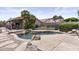 An inviting backyard pool and patio area, ideal for entertaining and leisure at 512 W Encinas St, Gilbert, AZ 85233